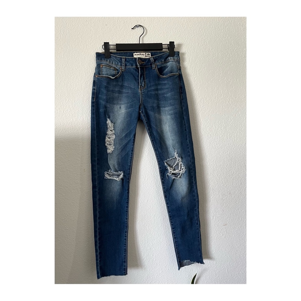 Blue Skinny Jeans with Distressed Details